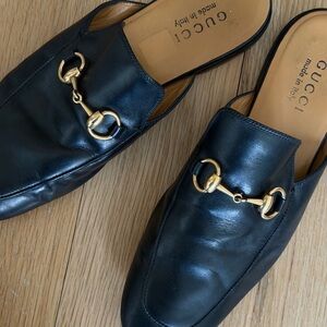Gucci Black Leather Mules with Gold Bit Detail